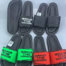 Sleek Unisex "Bring the Winds" Rubber Slides Available in Different Colours and Sizes Wholesale Quantity and price