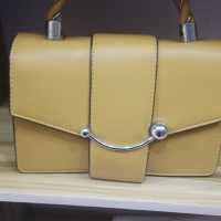 Quality yellow Leather stock Twisted Handle Hand Bag For Ladies