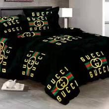 Gucci bedsheet and duvet with 4 pillow cases