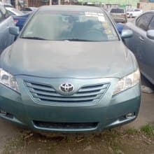 Green Toyota Camry LE